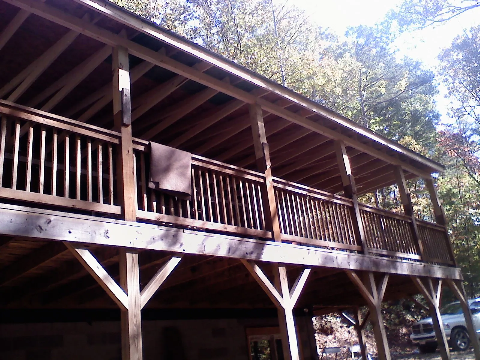 Timber framing under a new elevated porch and deck — Roof Leak Repair in Oak Ridge by Roofing Brothers